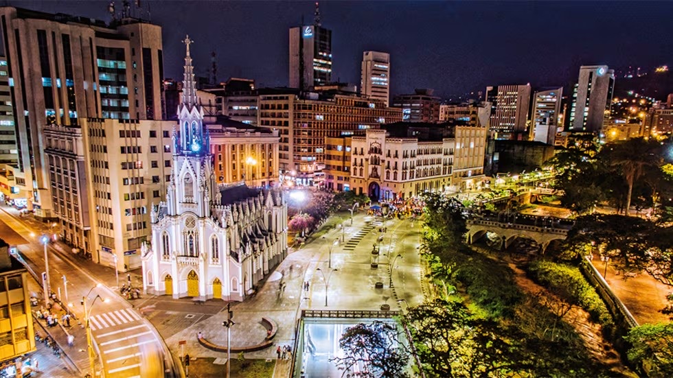 Aerial night view of Cali, Colombia — the city where Dra. Paola Chicue's dental tourism clinic is located
